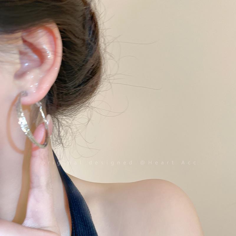 Elegant Silver Hoop Earrings with Unique Design for Women