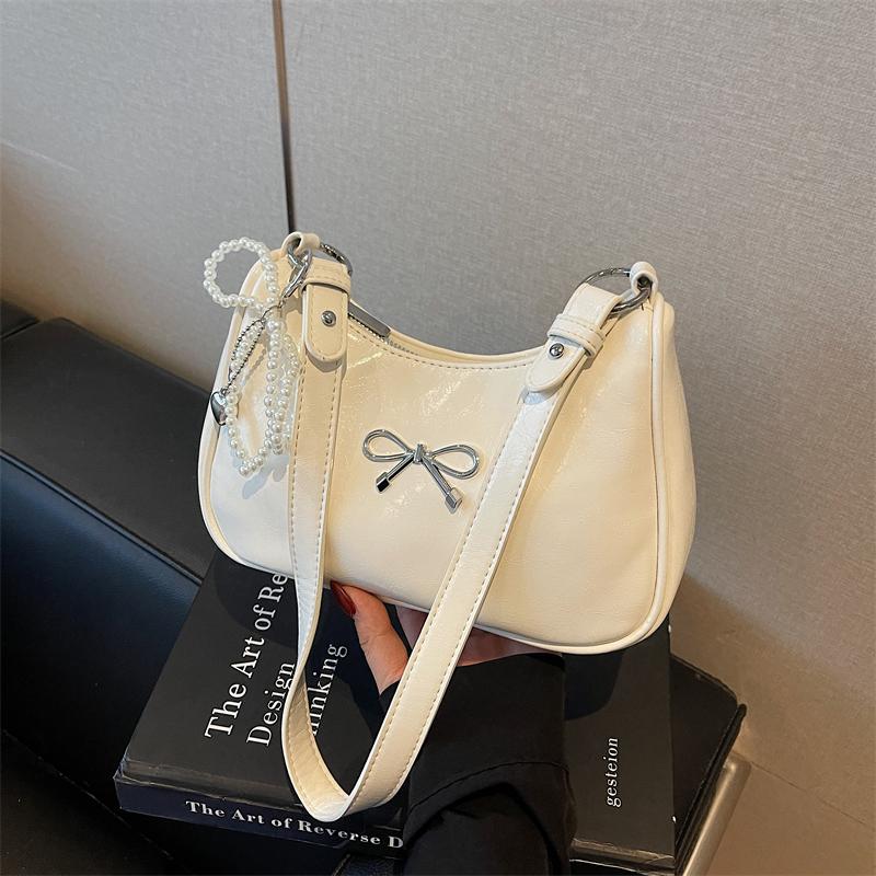 

Сумки через плечо Дизайнерские сумки с бантом Отправить подвески Модные полиуретановые сумки Застежка-молния Сумка под мышкой для женщин для поездок на работу белый