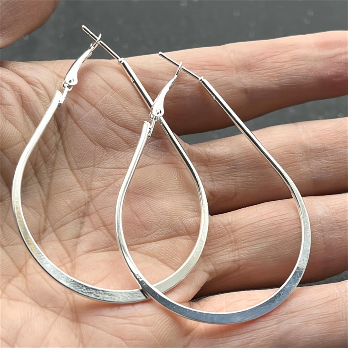 Модные серьги-кольца разного размера и дизайна — фото 5