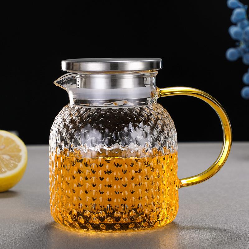 

Heat Resistant Glass Water Pitcher with Hammered Design for Juice Tea Cold Water Home Use As shown