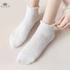 Chaussettes mignonnes respirantes à la cheville pour femmes Chaussettes solides Chaussettes décontractées à volants pour femmes Chaussettes d'équipage respirantes