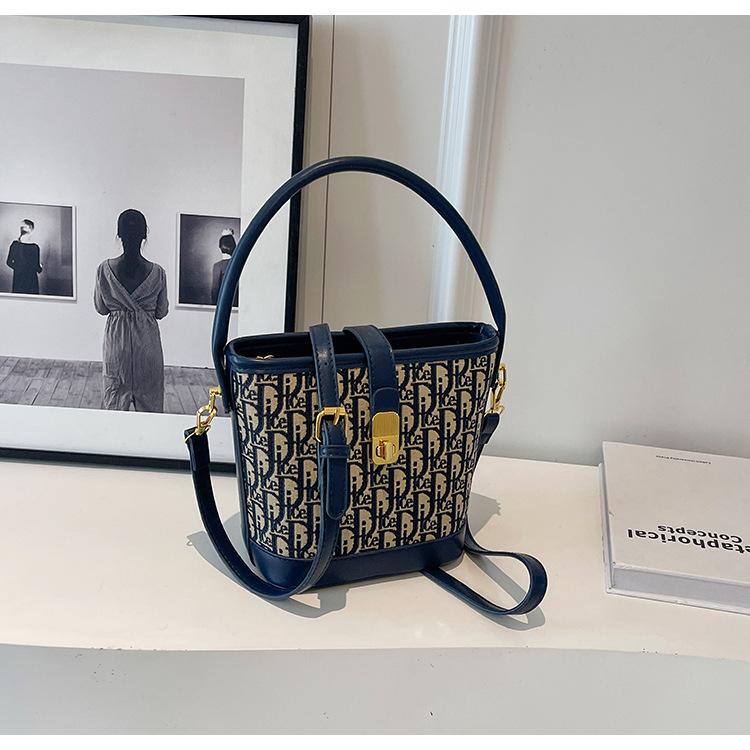 

Винтажная нишевая сумка-ведро 2025 премиальный стиль женская сумка для поездок на работу сумка-мессенджер интернет-знаменитость взрывная модель принтованная наплечная сумка темно-синий