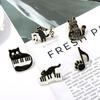 Spilla Gatto Cartone Animato Tasti di Pianoforte Nota Musicale - Accessorio Carino e Versatile