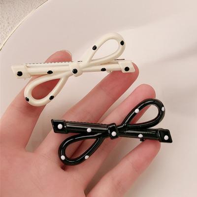 2Pcs French Style Hairpin Dot Print Hollow Bow Design Hair Clips Face Slimming Versatile Hair Accessory