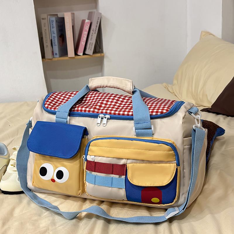 Fashion new cute and lightweight portable girls bag cartoon dopamine high value large capacity going out duffel bag