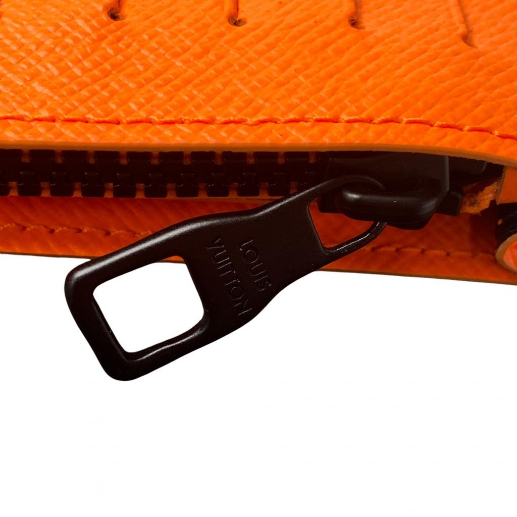 Używany portfel LOUIS VUITTON Seria Brązowo/Pomarańczowa PVC męski