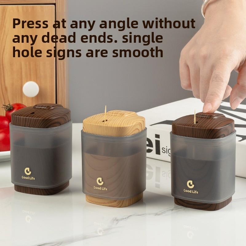 Luxusní domácí špičkový personalizovaný kreativní držák na párátka s tlačítkovým mechanismem