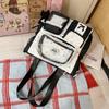 Spring new color contrasting two-piece backpack for primary and secondary school students, high-value dopamine make-up bag for high school students