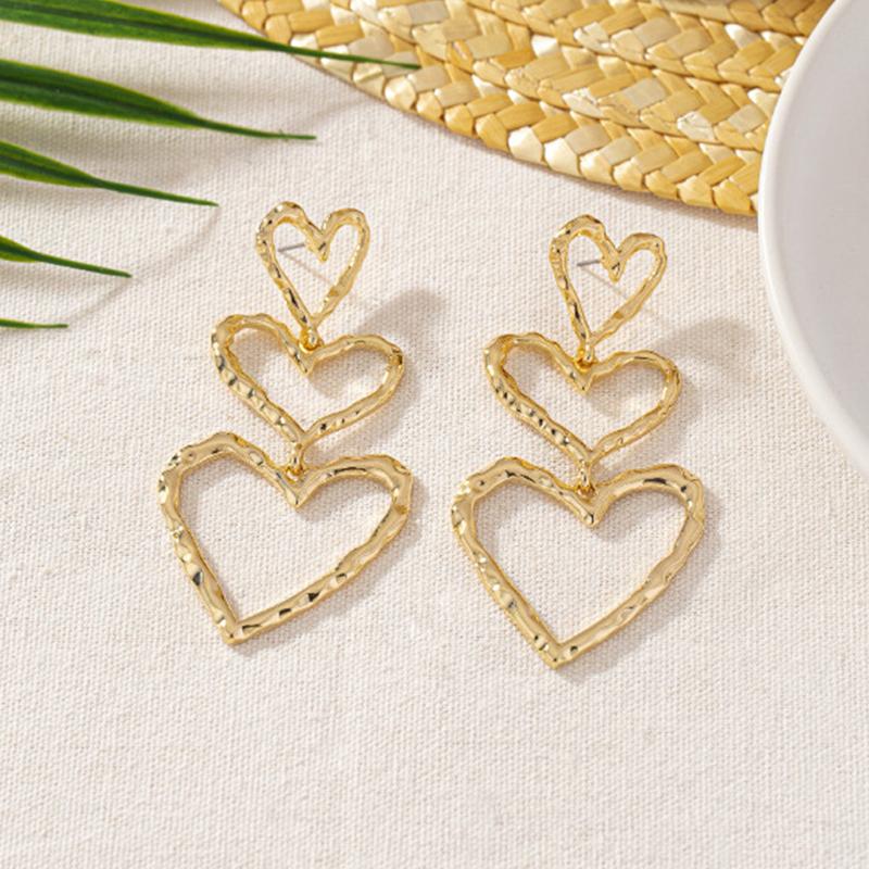 

Minimalist Metal Heart Hollow Pendant Earrings for Women Luxury Gold Color Love-Shaped Cluster Dangle Earrings Fashion Zircon золотой