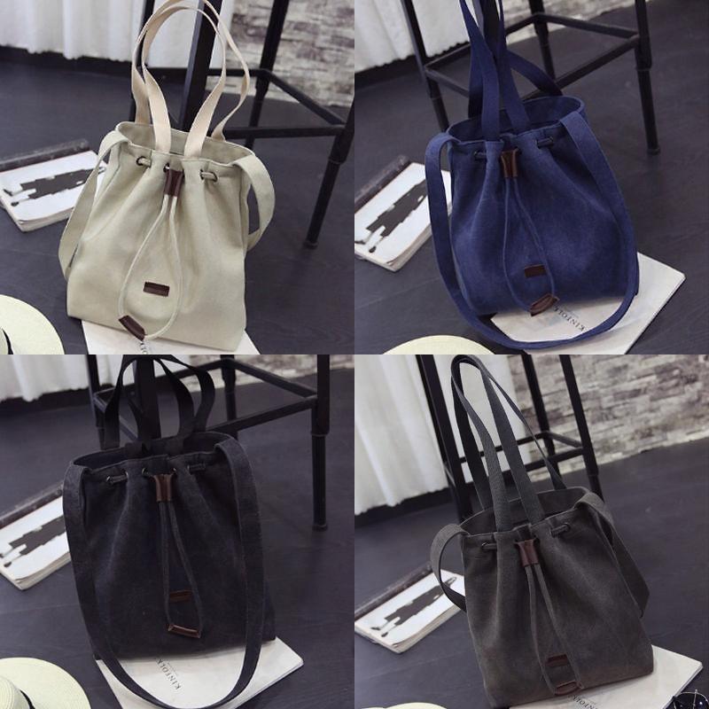 Elegant Women's Canvas Black Handbag With Adjustable Shoulder Strap And Soft Handle