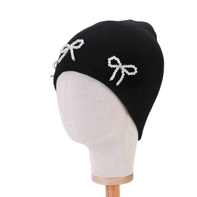 Pearl Bow Knit Hat: Trendy Korean-Style Autumn/Winter Pullover with Ear Protection.