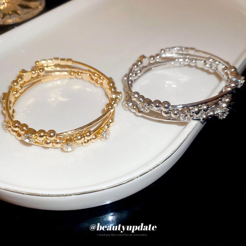 Diamond-encrusted multi-layer geometric round opening bracelet, metal bracelet, bracelet, light luxury high-end jewelry.