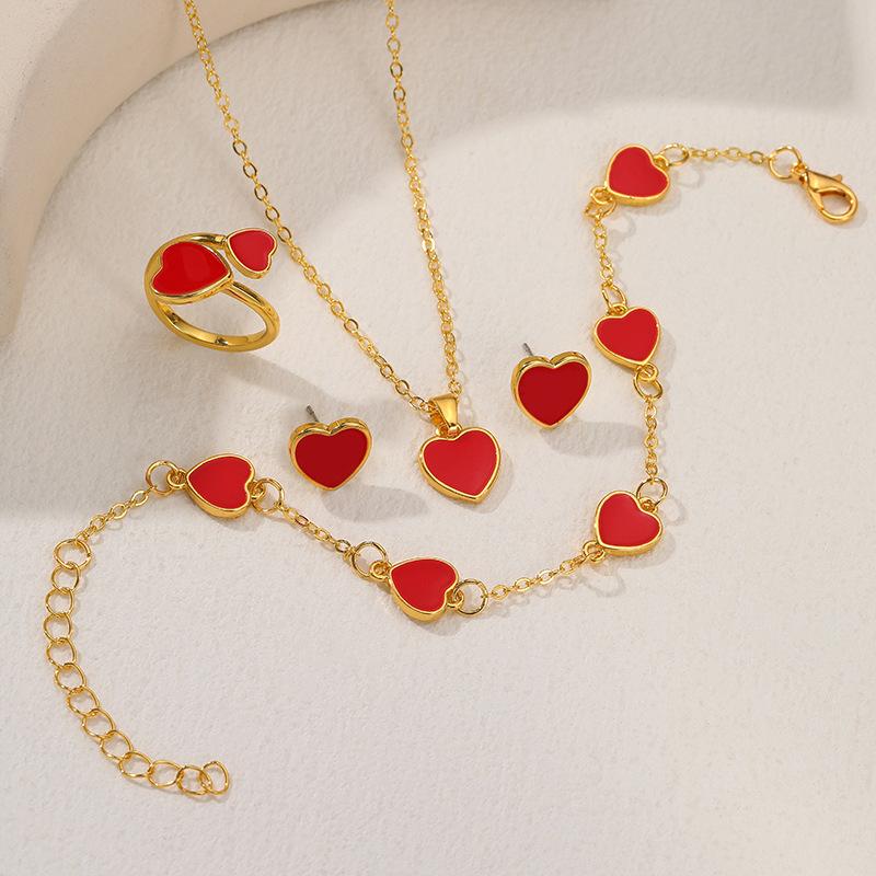 Heart-shaped Jewelry Set, Fashionable and Romantic, Exquisite Asymmetrical Love Heart Pendant, Four-piece Set of Jewelry.