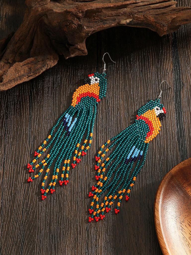 A pair of handmade beaded long earrings for women, in various colors, with tassels and woven patterns, suitable for everyday wear and vacations.