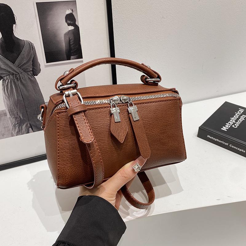 

New soft leather handbag women s first layer cowhide women s bag shoulder messenger bag large capacity bear small square bag