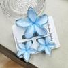 Set di pinze per capelli a forma di frangipani: Accessori per Capelli Floreali in Finto Marmo per Vacanze alla Moda