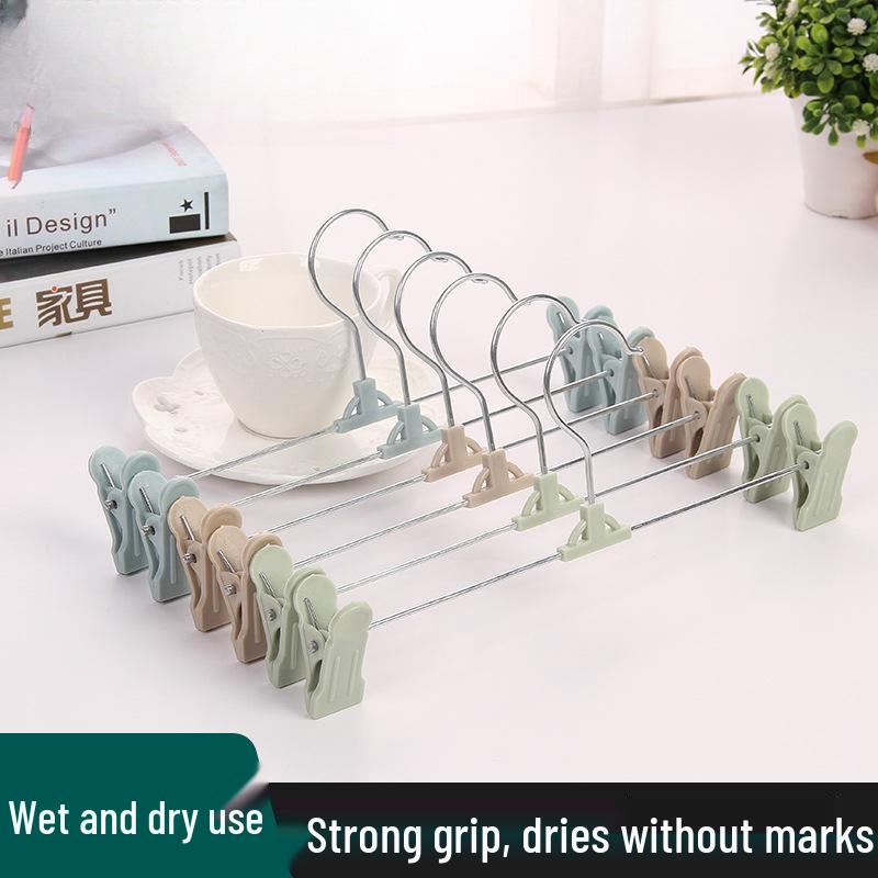 Retractable Stainless Steel Non-slip Hanger with Adjustable Clips for Trousers, Skirts, Underwear, and Socks.