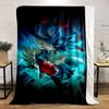 A dynamic blue creature with red accents surrounded by glowing energy. for all seasons blanket lunch break throw gift