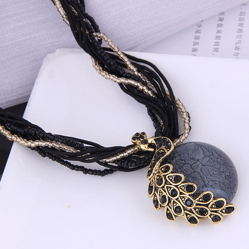 Elegante Vintage Fransen Quaste Anhänger Halskette Pfau Design für Damenpullover