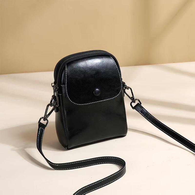 Leather small bag women's new spring and summer fashion vertical mobile phone bag cowhide multi-layer versatile shoulder messenger bag