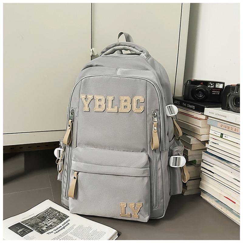 

Школьный рюкзак новый нишевый дизайн высокой ценности рюкзак для пары повседневный простой легкий рюкзак большой вместимости