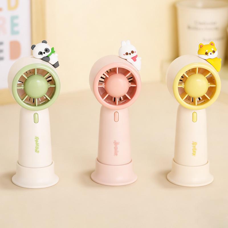 2026 Mini USB Rechargeable Handheld & Desktop Fan - Cute Doll Design Three-speed [500mAh]