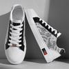 Frühling Neue Schuhe für Herren Leder Freizeitschuhe Trendmuster Flache Skateboard-Schuhe Jugend Street Cool Schnür-Sneaker