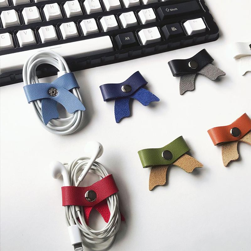 1 Stück PU Leder Schleife Datenkabel Organizer Kabelaufwickler Riemen Kopfhörer Wickler Aufwickler Ordentliche Aufbewahrung Kabelhalter Clips Binder