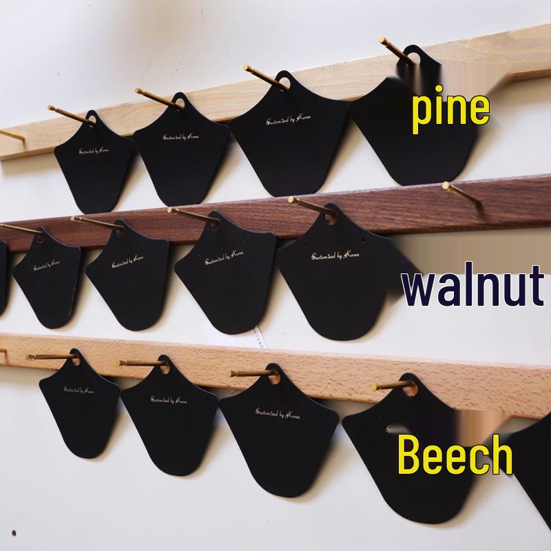 Nástěnný stojan na šperky z masivního dřeva - Design s rozestupy pro hřebíky a závěsnou tyčí