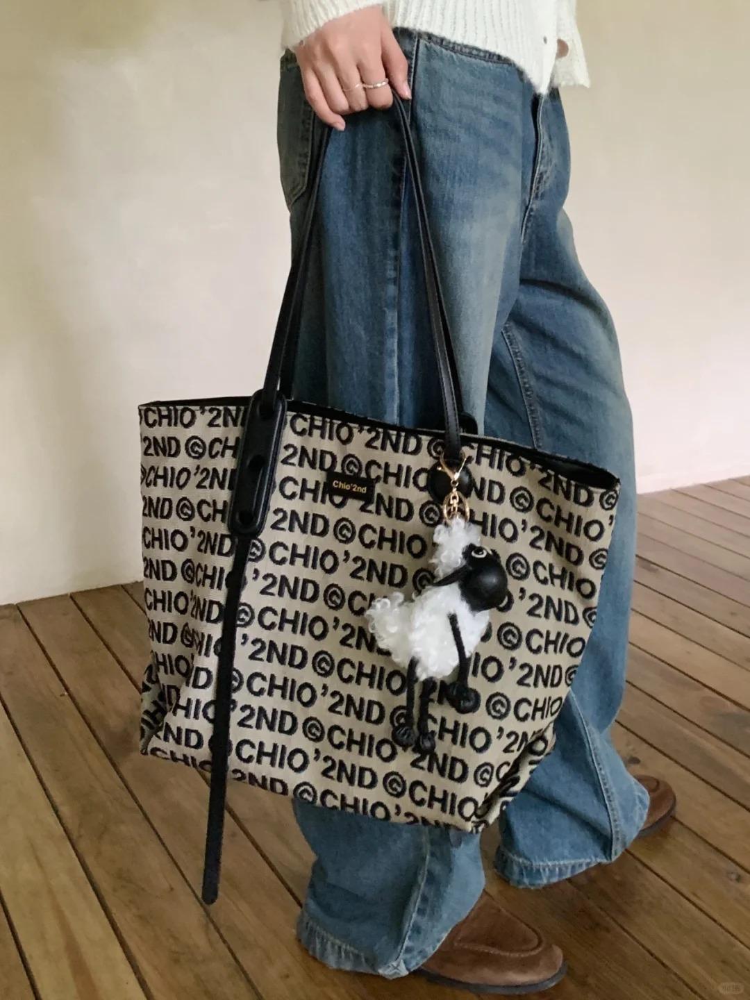 

2024 Осень Винтаж Большая вместимость Премиум Sense Commuter Студенческая Универсальная Сумка через плечо из холста Ручная женская сумка чёрный