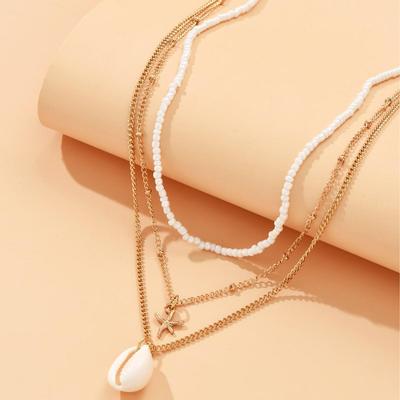 Ocean-Inspired Women's Multi-Layered Starfish & Conch Pendant Necklace