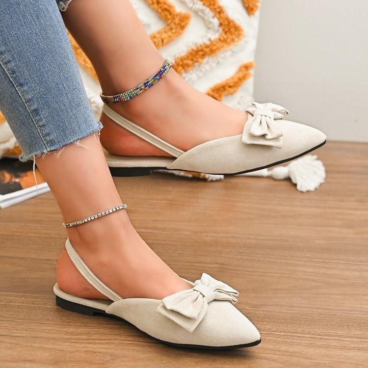 

2025 Xiaoxiangfeng сандалии с заостренным бантом, новые французские модные сандалии с пустым мешком на голове, сандалии на плоской подошве 35