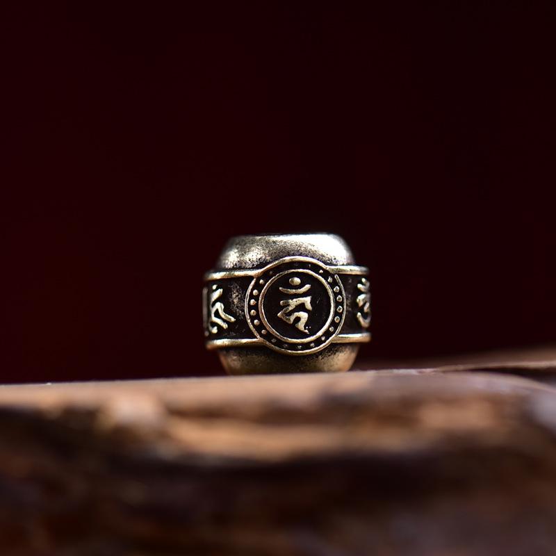 

Браслет ручной работы из меди с буддийской подвеской и квадратными разделительными бусинами