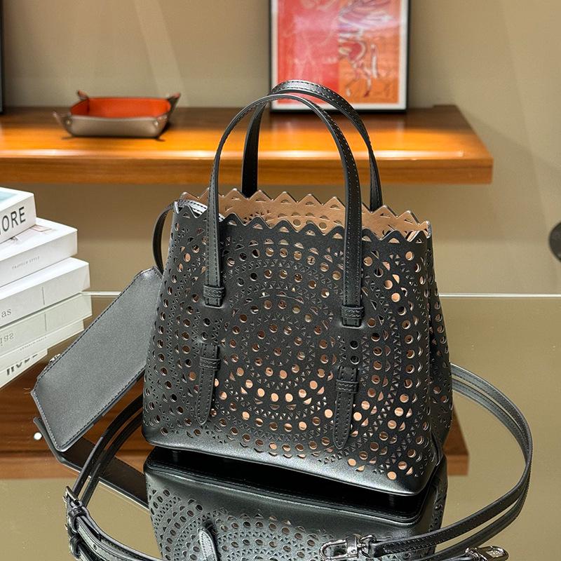 Trendy Carved Calfskin Handbag with Long Crossbody Strap