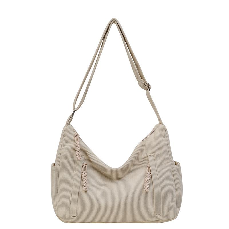 

The New Large-capacity Handbag for Autumn and Winter Features A Fashionable Striped and Wavy Pattern 37*25*10 белый