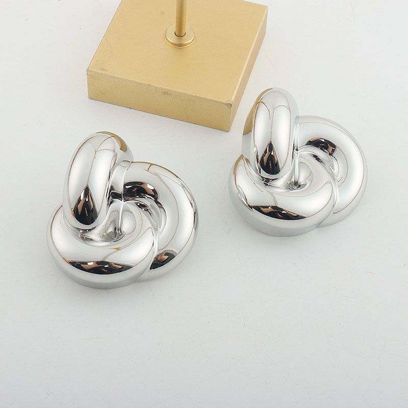 

Yang Shulin Song Jia Style Exaggerated Knot Metal Geometry Earrings Female Earring Circle Silver Stud Earrings Ear Rings Ear Clip Silver earrings (with pierced ears)