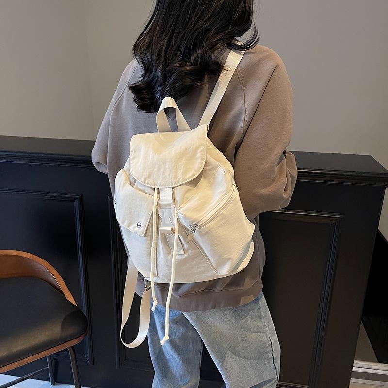 New Korean version of leisure niche design handbag large capacity personalized student class commuting leisure backpack