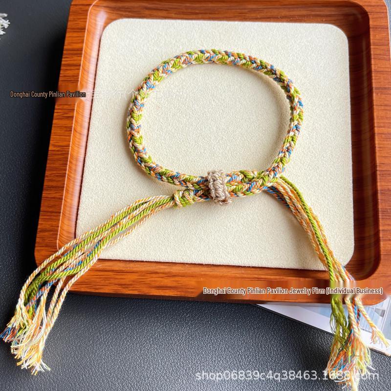 Tibetan Wealth Gods Handmade Eight-Strand Braided Bracelet with Green Tara Thangka