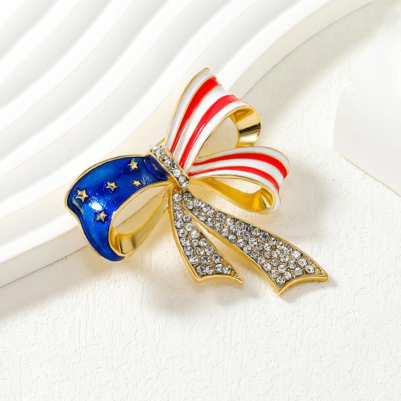 Brož ve tvaru mašle s americkou vlajkou, niche high-end univerzální, brož osázená diamanty, evropská a americká, personalizovaná, s kapkami oleje