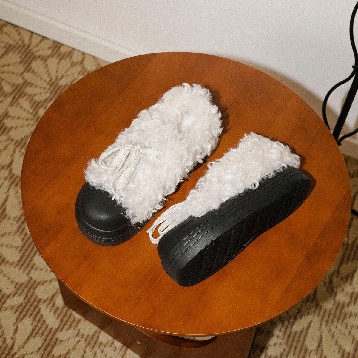 

Stylish niche thick-soled fluffy snow boots women s French thermal lace-up winter cotton shoes 36 чорний