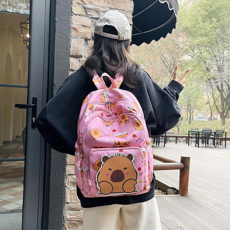 Schoolbag backpack new 1011 cartoon cute printing large capacity high value college style casual simple spine protection schoolbag