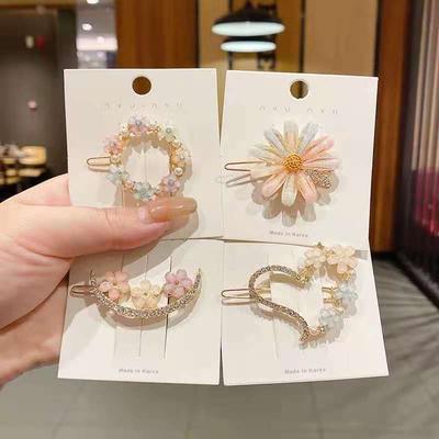 4 Stück trendige neue florale Kristall-Haarnadeln, schlichte Haaraccessoires und froschförmige Haarspangen für Pony und Deckhaar.