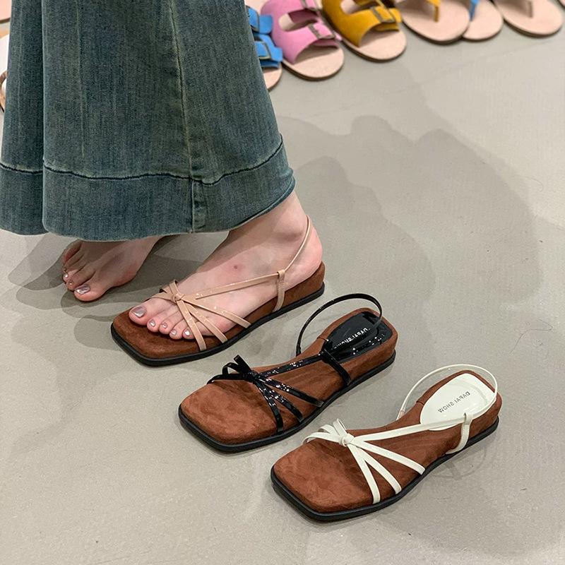 New French slope with skirt women's naked powder outer wear 2025 summer cool heel retro niche temperament thin strap Roman shoes