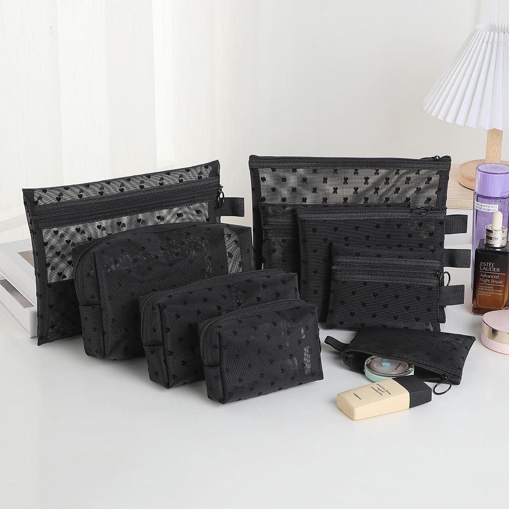 Přenosná kosmetická taška přes hranice s designem ve stylu rtěnky a zapínáním na zip