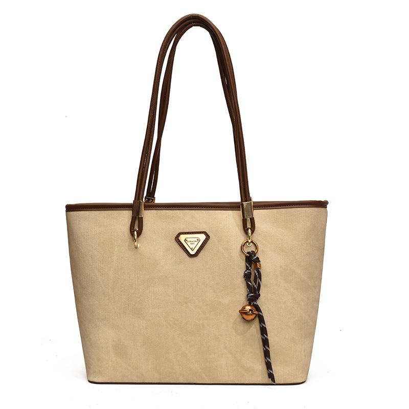 Höst och vinter ny enkel stil nischmode hög känsla toteväska dam pendlar stor kapacitet axelväska