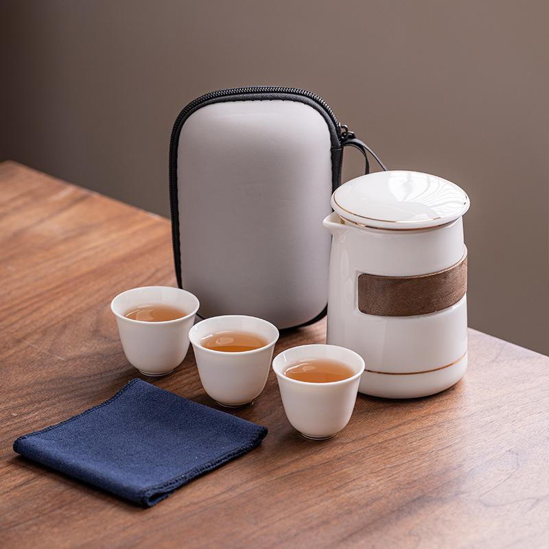 Suet jade white porcelain travel tea set portable storage bag high-end one pot three cups corporate business gifts
