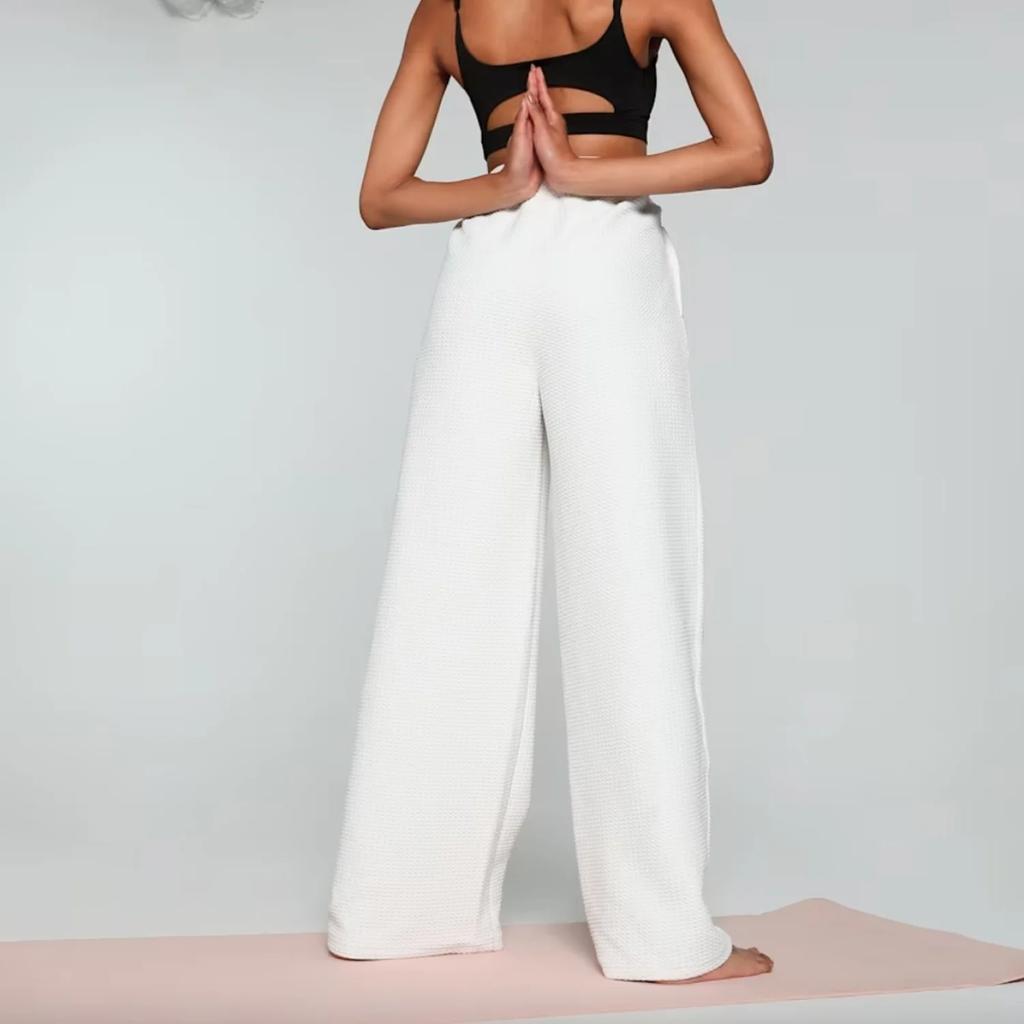Puma Studio Logo texturé Léger Respirant Ample Jambe large Tricot Pantalon de sport Femme pantalon 525758-05