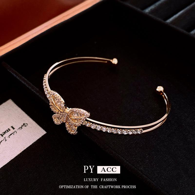 Echtgold-galvanisiertes Zirkon-Schmetterlings-Öffnungsarmband Leichter Luxus High-End-Armband Nischen-Vielseitigkeitsschmuck