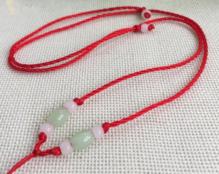 Șnur de performanță pentru ocarină: Colier țesut din jad cu mărgele de semințe cu buclă dublă, perfect ca pandantiv sau accesoriu pentru instrument muzical.