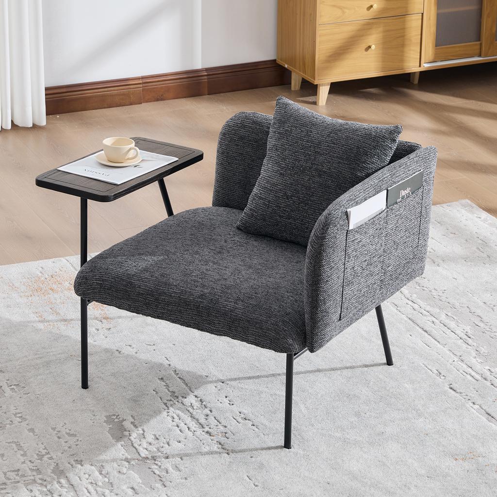 Modern single armchair with comfortable fabric backrest and two storage compartments, complemented by a practical side table.